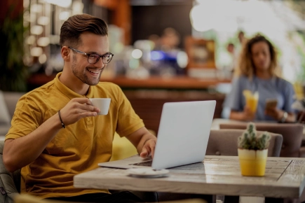 Young smiling man watching storm stream